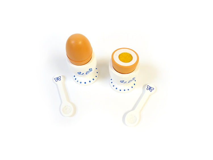 Eierbekers met eieren